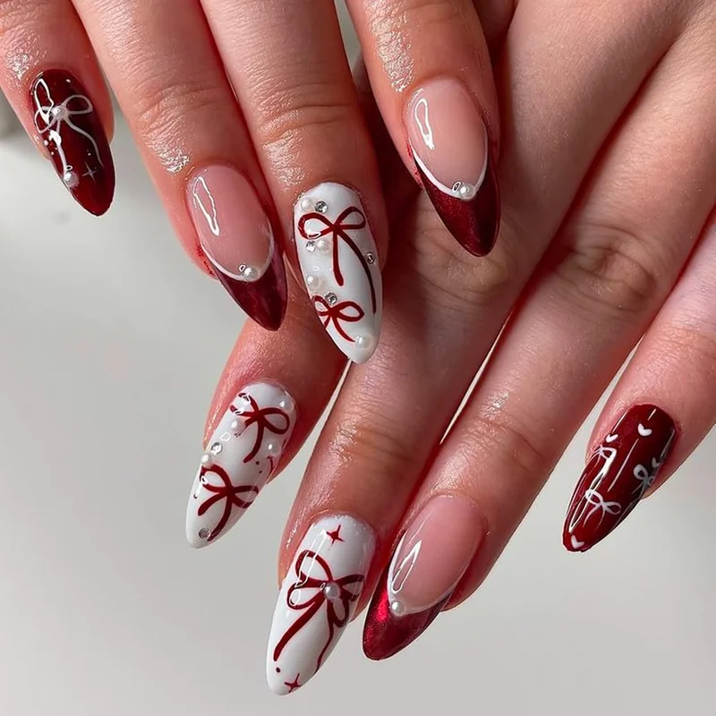 3D bow nail art red ribbons white French tips Christmas gift wrap holiday manicure festive designs elegant nails 2025