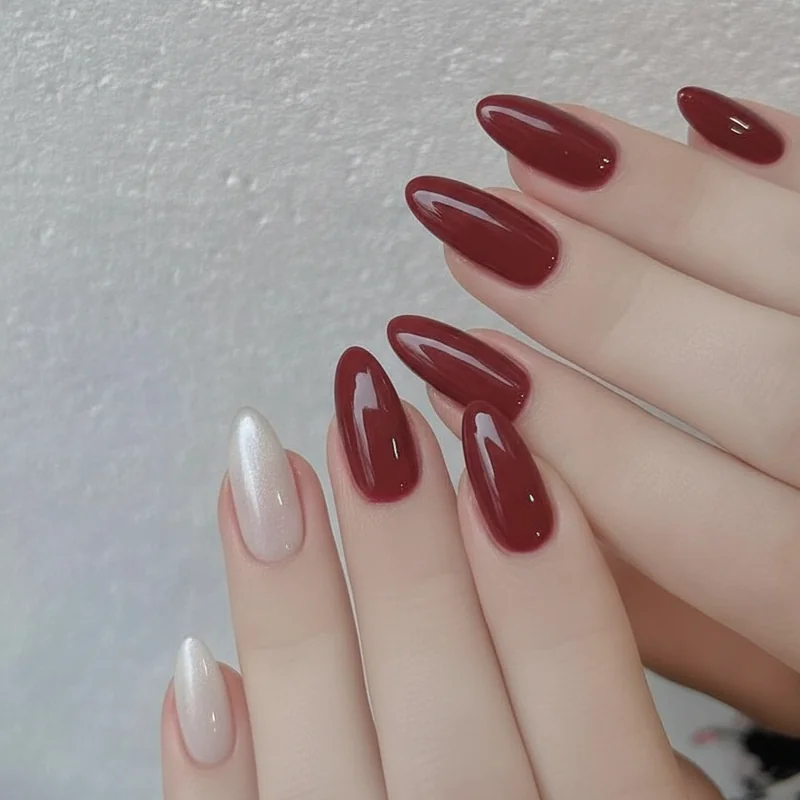 Quiet luxury nails versus old money nails comparison showing milky almond manicure beside classic heritage shade on rounded natural shape