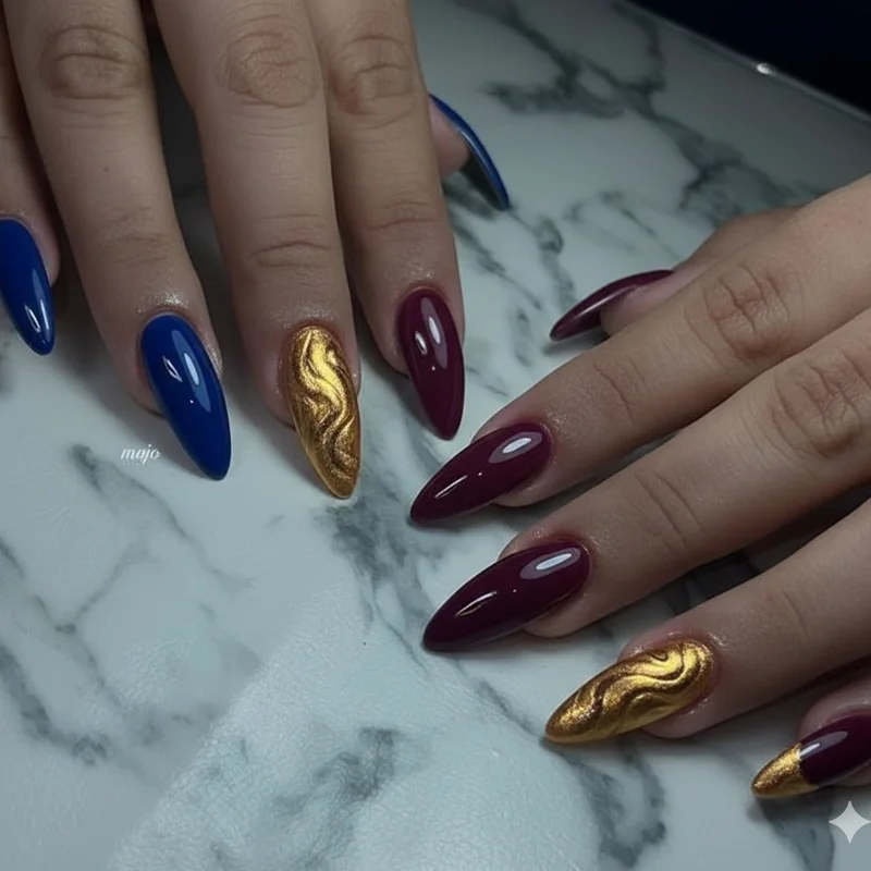 Almond nail ideas for dark skin tones with cobalt blue deep plum and gold chrome for rich contrasting designs