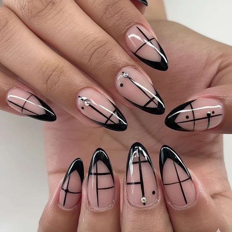 Black French tip almond gel nails for moody statement graphic bold manicure with sharp smile line and nude base