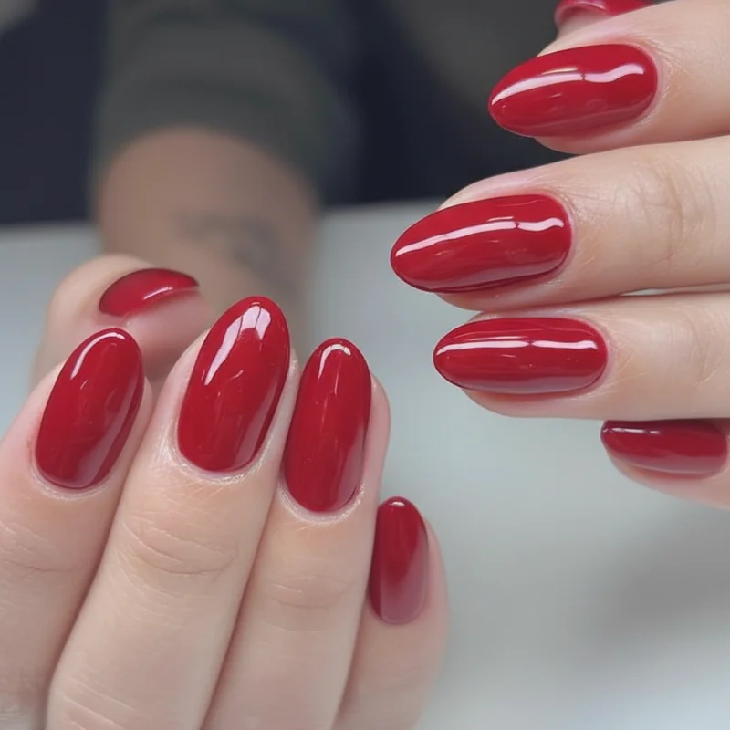 Cherry red almond nail ideas for bold statement manicure with tapered tip softening vintage bombshell vibe 2026
