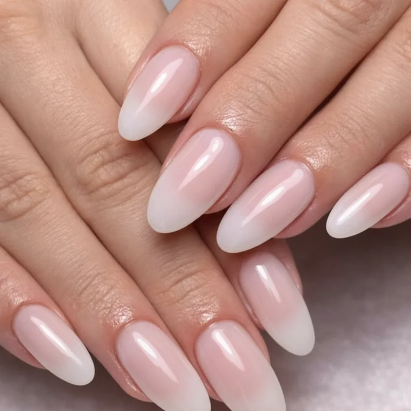 Cloud dancer white sheer gloss almond nails simple minimal refined look with subtle warmth in creamy tone