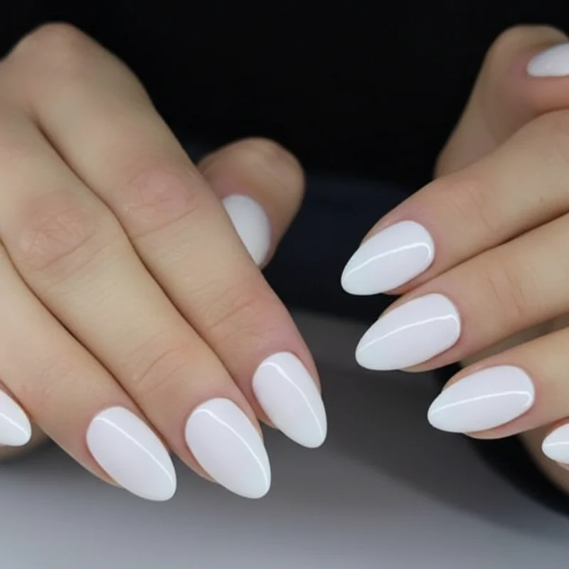 Milky white almond gel nails with clean girl aesthetic high gloss finish for understated everyday manicure