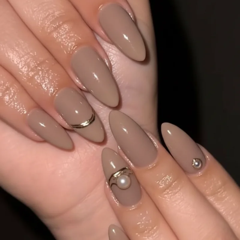Old money neutral almond acrylic nail ideas in muted beige and taupe for quiet luxury everyday elegant look