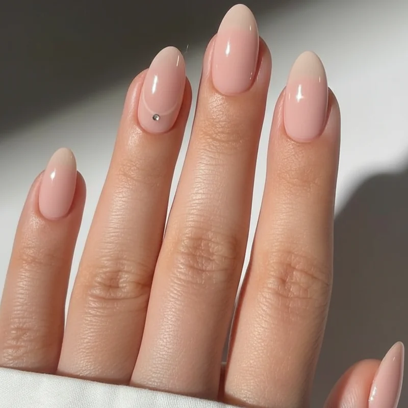 Quiet luxury nude BIAB almond nails in sheer pink for everyday office-safe elegant daily wear in 2026