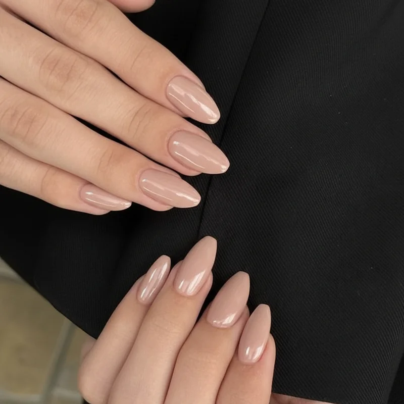 Nail shape suitability guide showing almond and coffin shapes on three hand types including short fingers wide nail beds and slender fingers