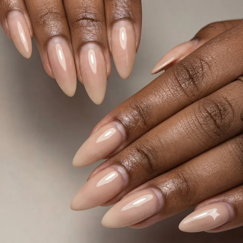 Buffed natural nails with soft sheen and no polish showing healthy bare nail shine