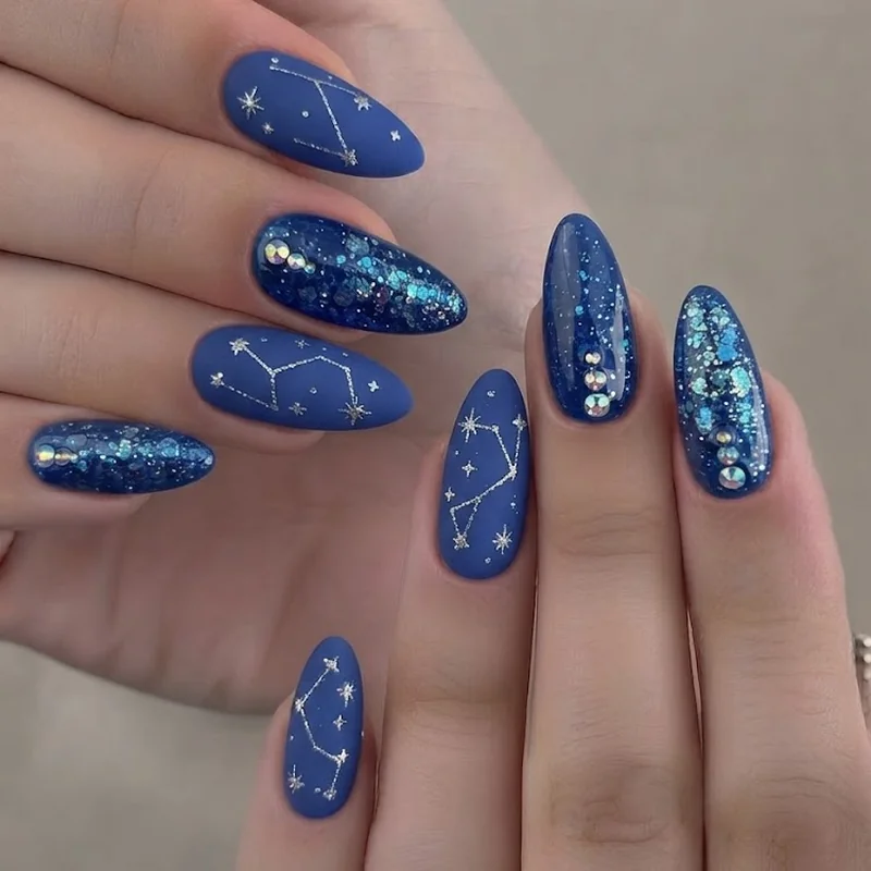 Finished concert-ready Benson Boone nails full manicure set in cool blue palette