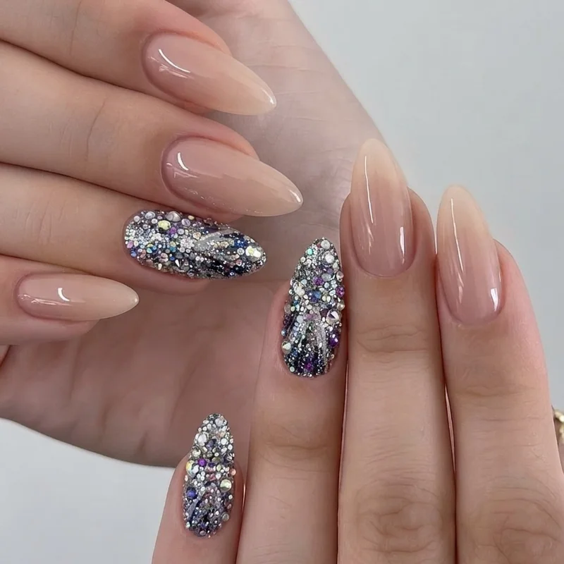 Rhinestone and glitter accent nail closeup for Benson Boone concert nail inspo