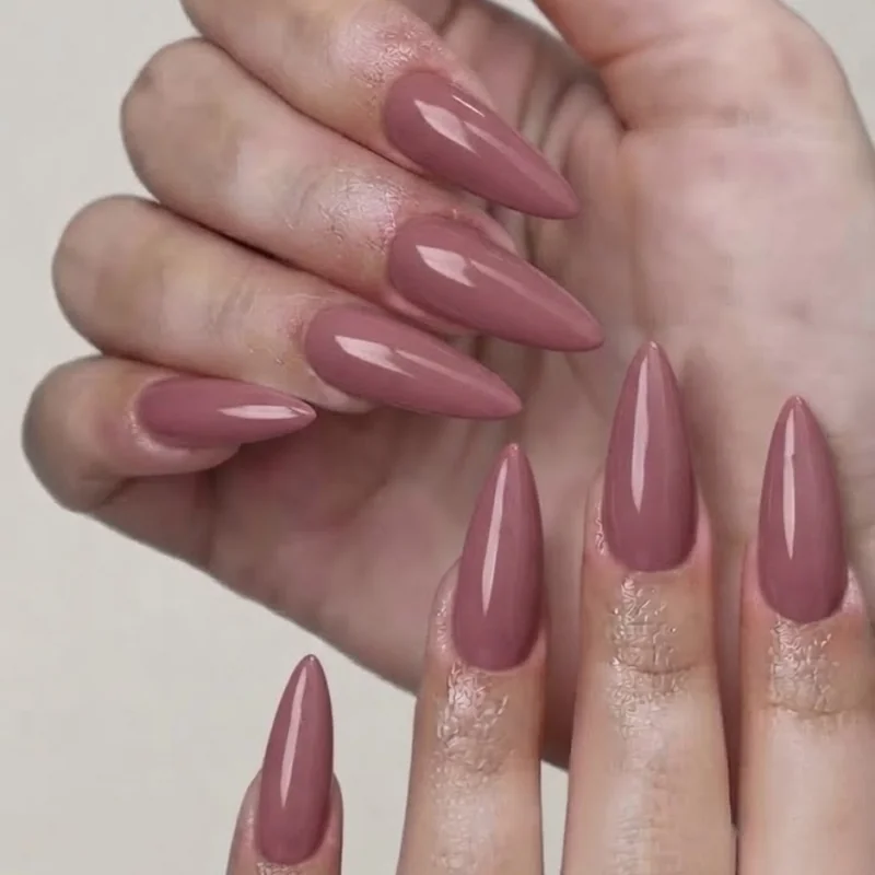 Dusty rose manicure on pale skin with pink undertones, the best overall nail color pick