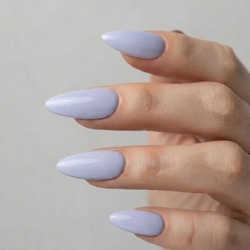 Lavender pastel manicure on pale skin, a cool-toned pastel that flatters pink undertone skin