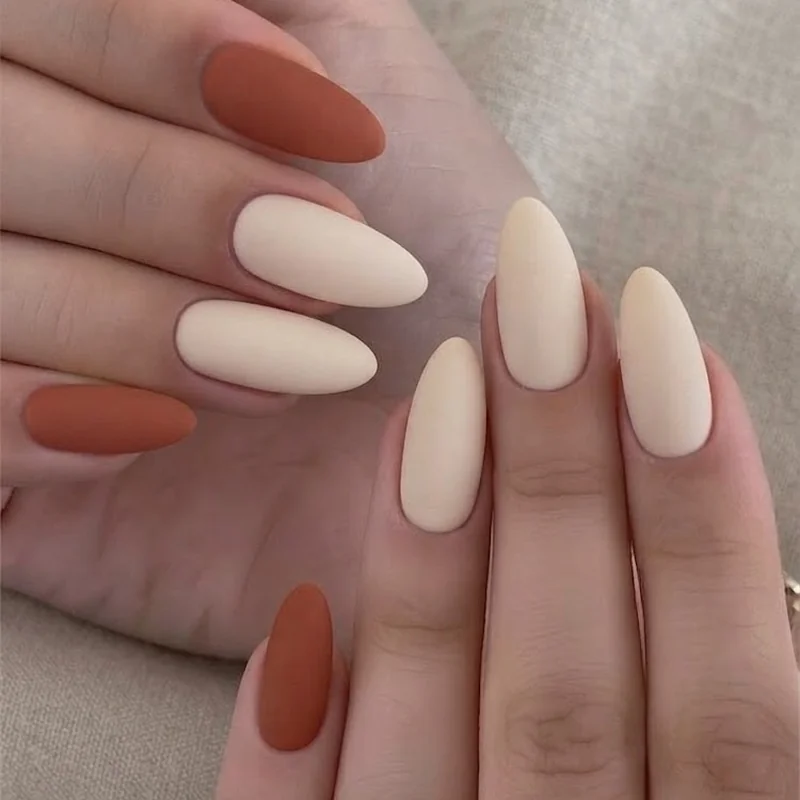 Terracotta earthy palette manicure with cream and deep brown solid color Cowboy Carter nail tones