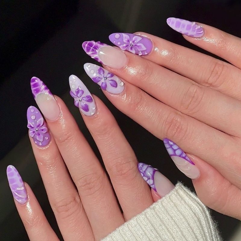 Trendy aura nails created with blooming gel technique featuring purple to pink gradient