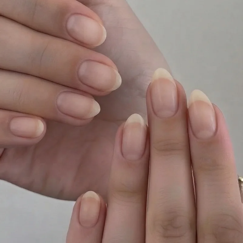 Close-up of braider nails mixed-length set with short pointer and middle