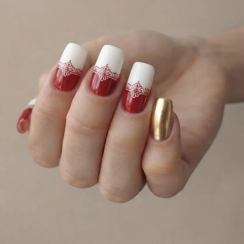 Short nail Arirang set with single gold accent nail on squoval shape, red and white base design