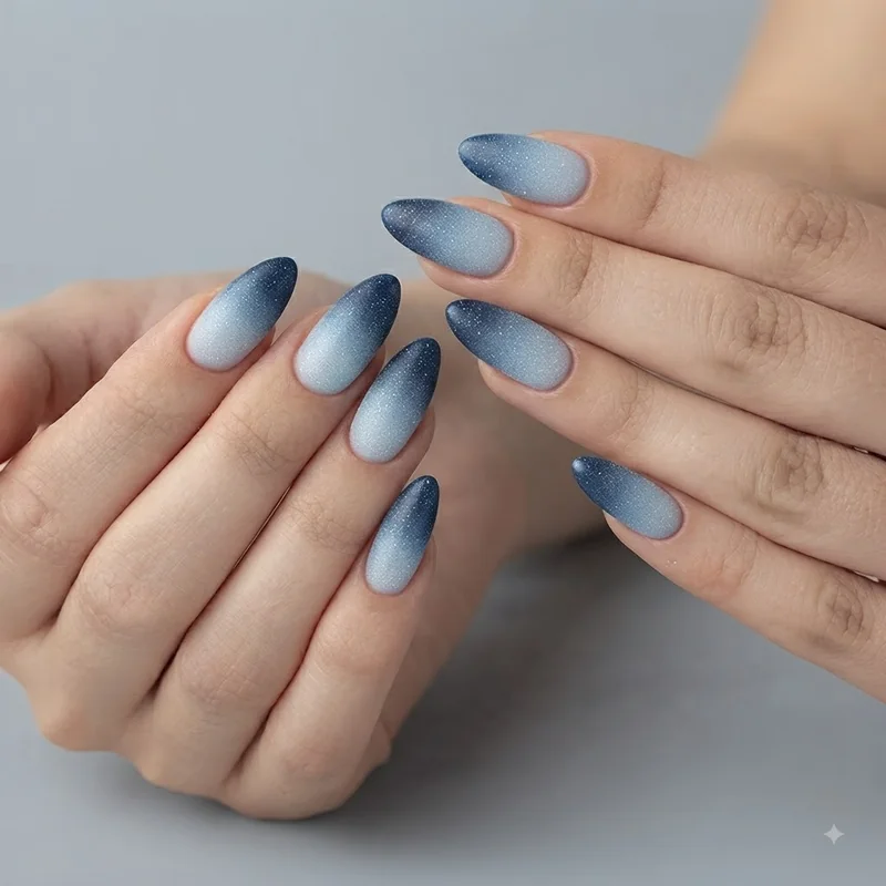 Icy blue navy Christmas manicure with frosty finish for winter styling