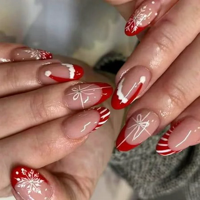 christmas press on nails being applied to short natural nails with nail glue tutorial demonstrating sizing
