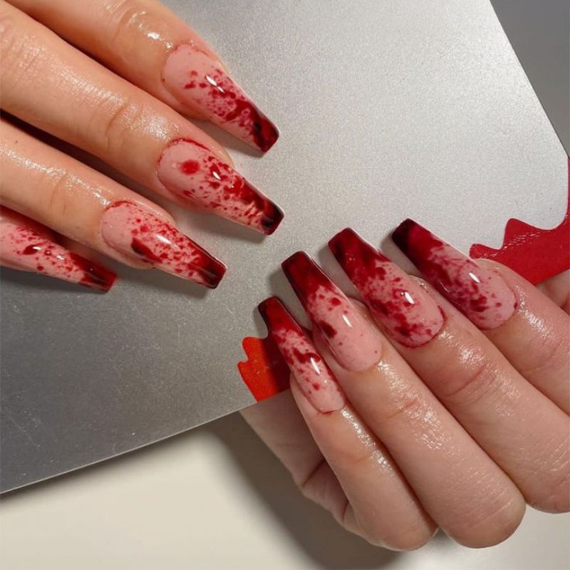 Coffin shaped vampire nails with gothic nail art