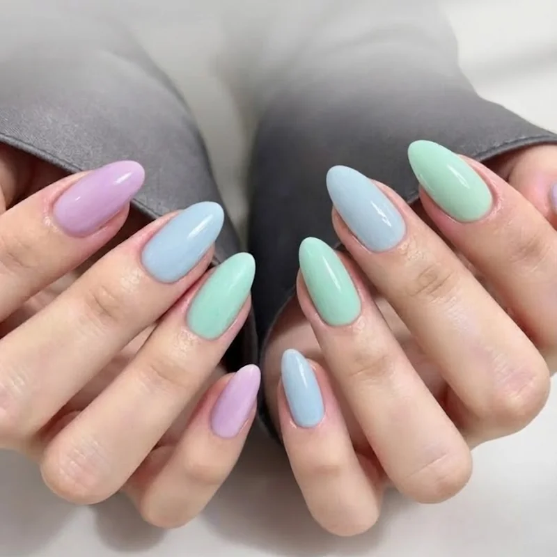 Pastel y2k nails skittle set in lilac baby blue and mint with milky white base coat