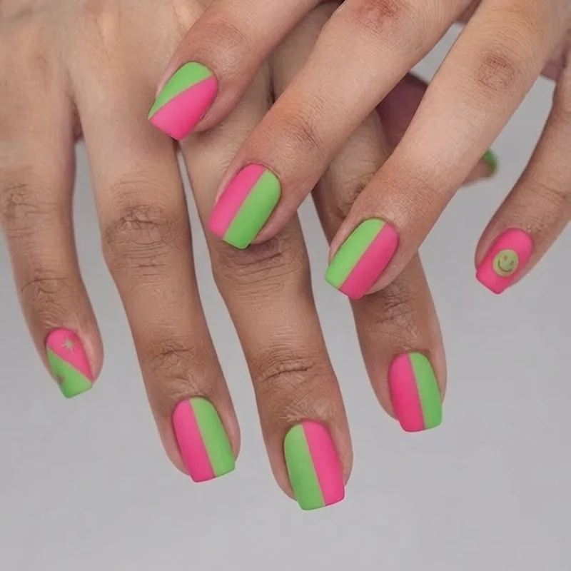 Short square colorful y2k nails in hot pink and green color block design on natural length