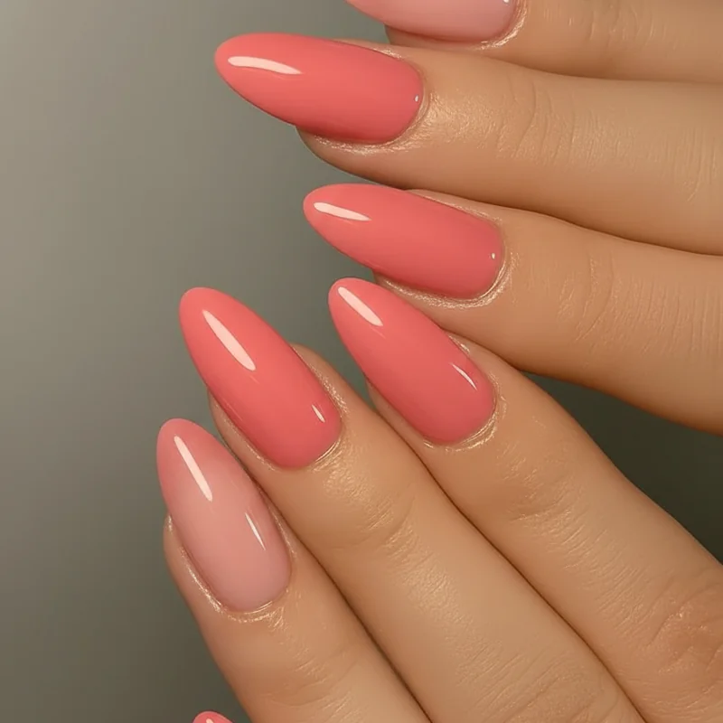 Coral nail polish bottle versus applied nail showing opacity between one coat and three coats checked under natural daylight