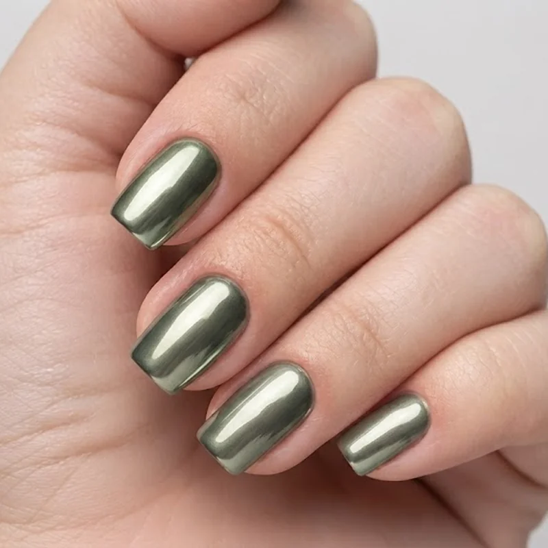 Chrome finish olive manicure with metallic sheen for dirty martini nails trend 2026