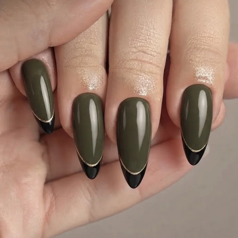 Dressy holiday dirty martini nails with gold accents and black French tip over olive base