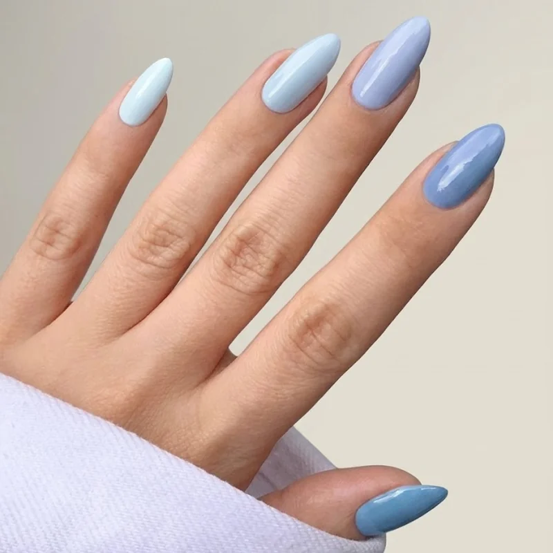 Palette driven Disney manicure showing an icy blue color story rather than character focus