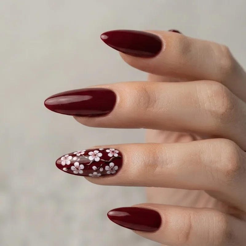 Close up of almond shaped Disney princess nails showing tapered tip detail and fine linework