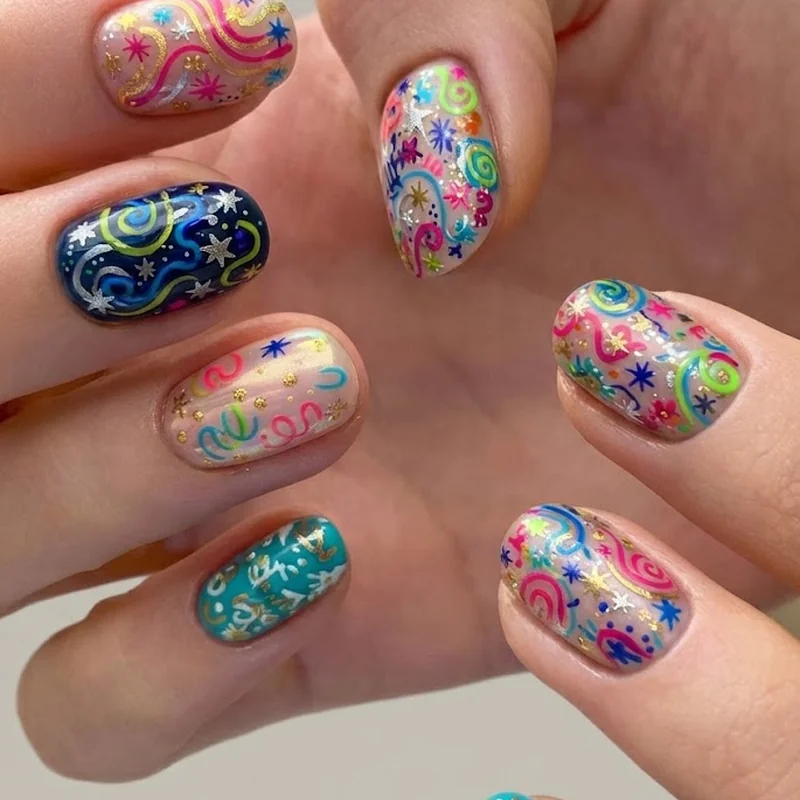 Maximalist hand-painted disney world nails featuring multiple characters across all ten nails in high detail