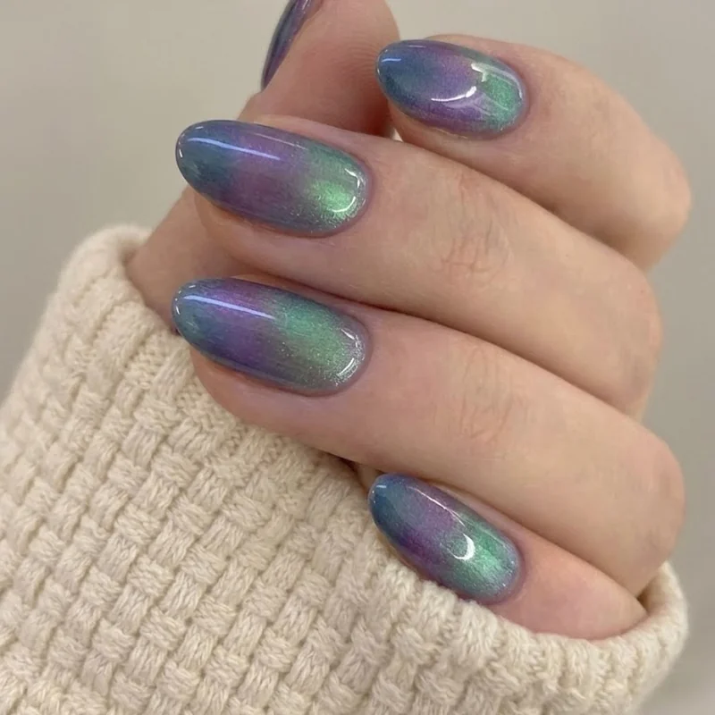 Aurora borealis frozen nails inspired northern lights gradient blue purple green design