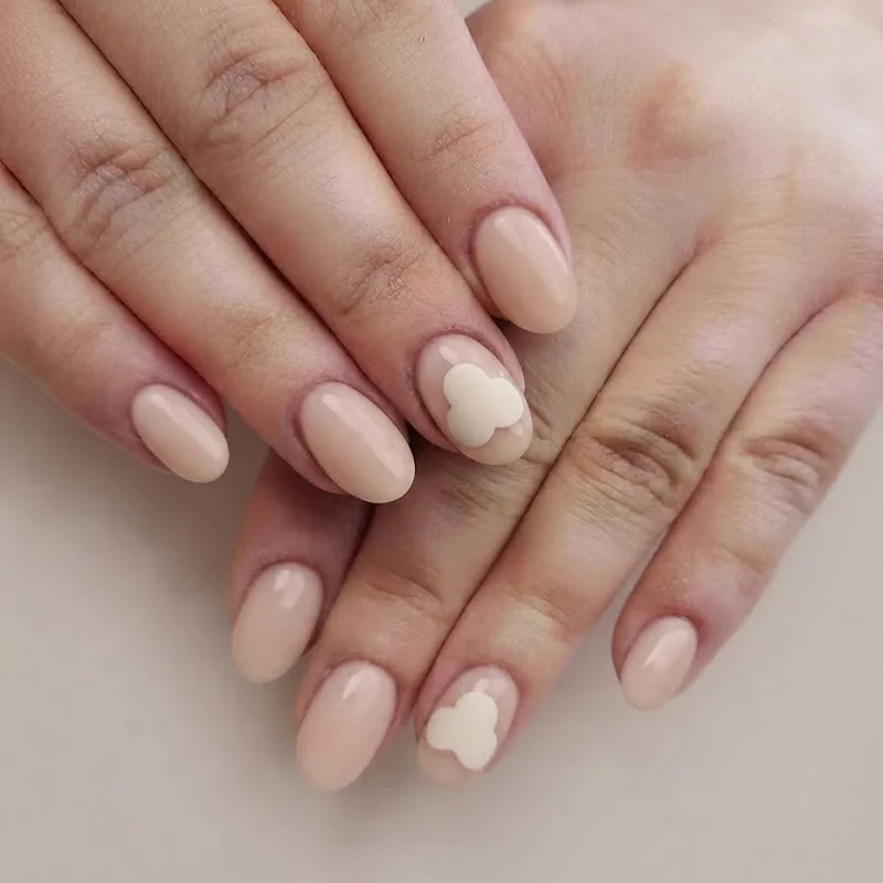 Short almond shaped mickey mouse nails with a single simplified silhouette accent nail, proving detail works on short length