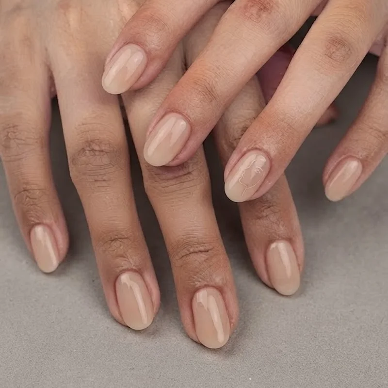Hidden Mickey subtle nail art detail on short natural nail manicure