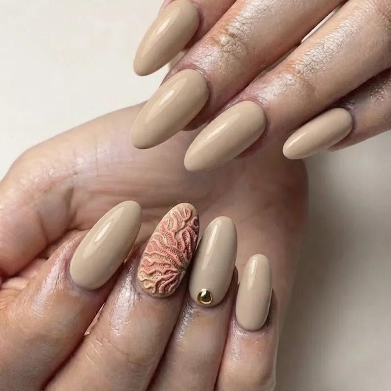 Short disney nail art with neutral solid base and single Mickey accent nail