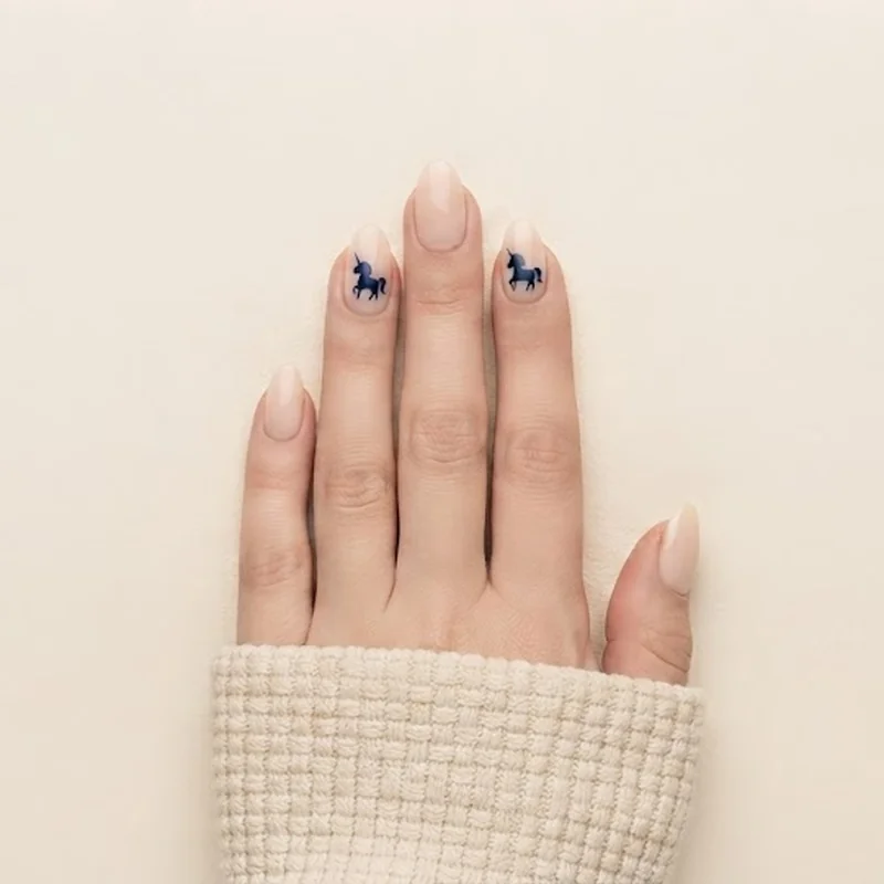 Minimalist stitch nails silhouette accent nail on nude and blue clean base design