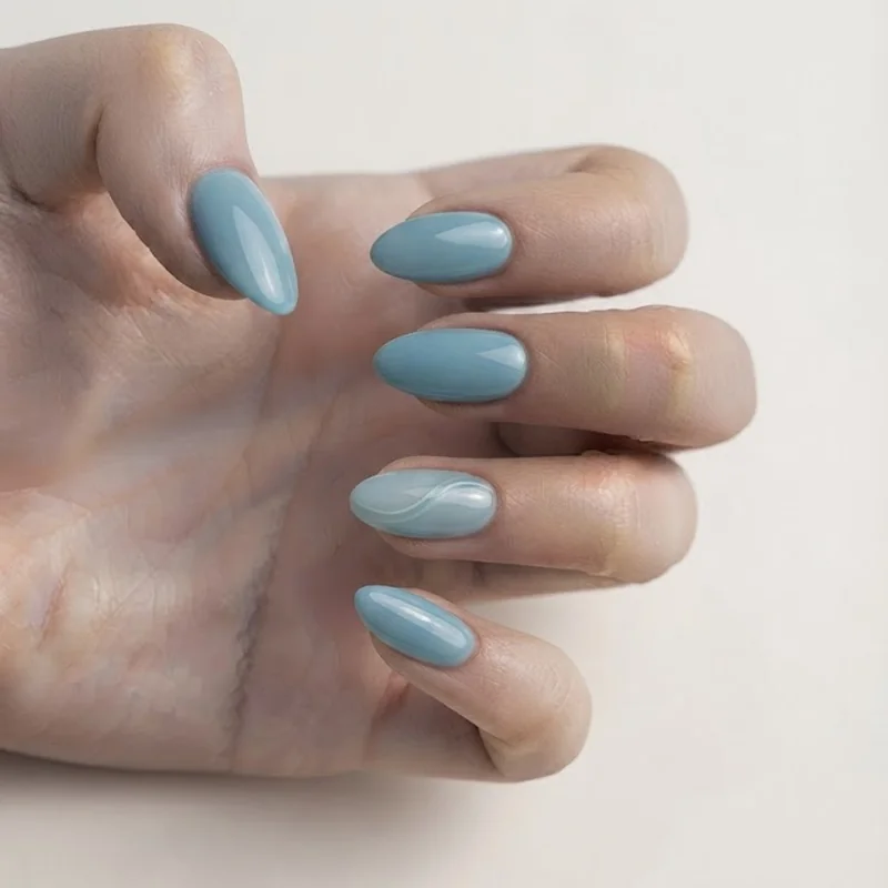Pool blue seafoam end of august nails styled with a beachy last summer trip context on almond shape