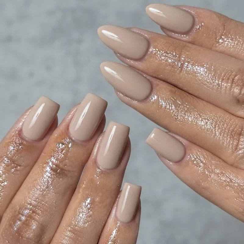 Short square and short almond end of august nails shown together in a neutral shade for shape comparison