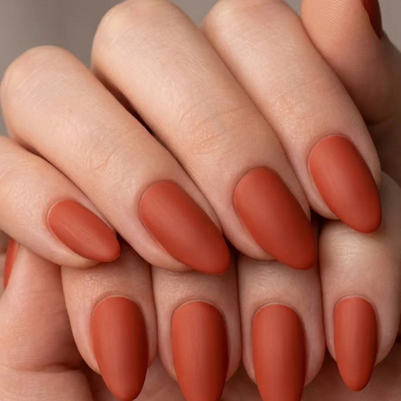Matte olive green manicure fall 2026 in deep forest tone on short square nails