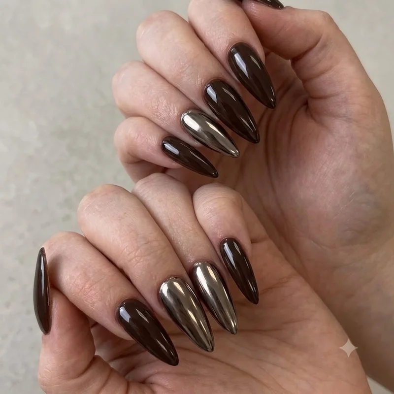 Matte plum purple manicure fall 2026 editorial styling on coffin shaped nails moody finish