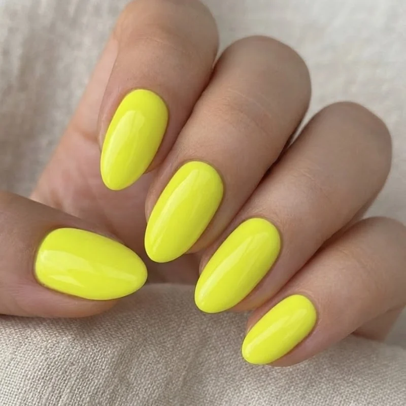 Single colour neon minimal rave nail set on short almond shape