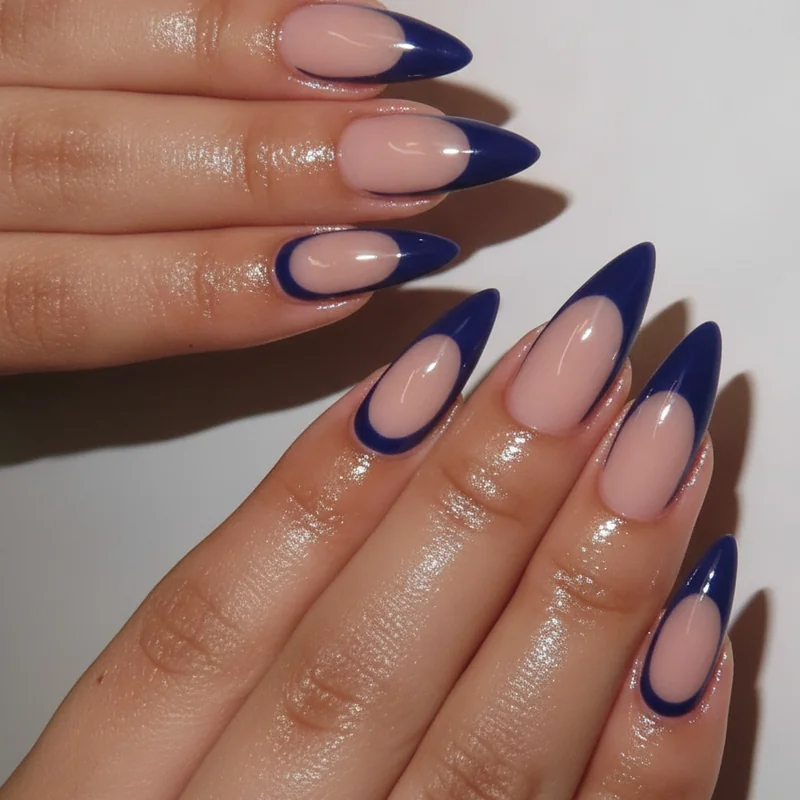 Reverse french manicure versus half moon manicure comparison showing painted arc versus negative space lunula nail base designs