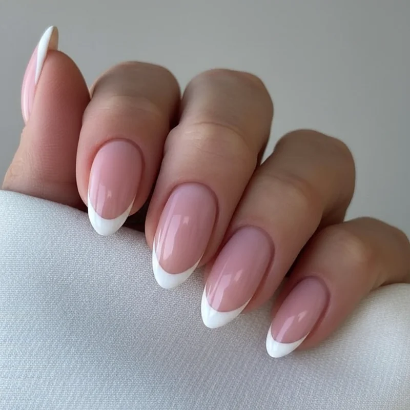 Almond nail smile line curvature showing tip proportion and finger elongation effect compared across short medium and long nail lengths