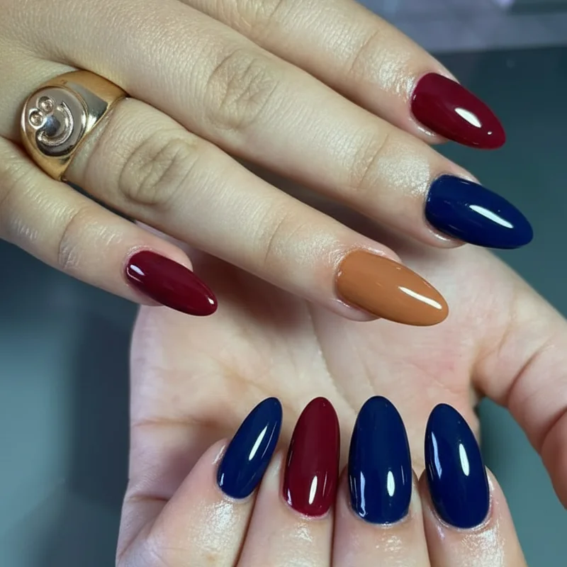Universal gel nail shades showing classic red burgundy navy warm caramel nude and true white opaque gel on fair medium and deep skin tones