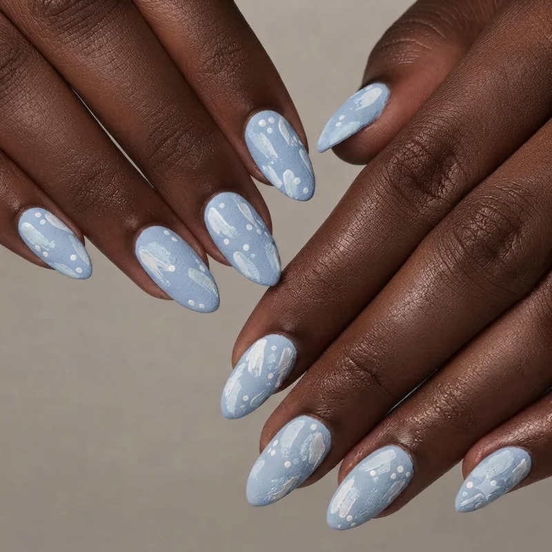 DIY Cinnamoroll nails hand-painted at home with a soft, approachable pastel blue and white manicure finish