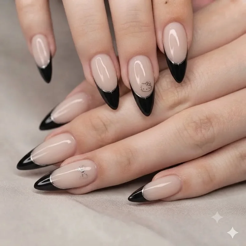 Black French tip Hello Kitty nail variation with edgier styling for adult manicures