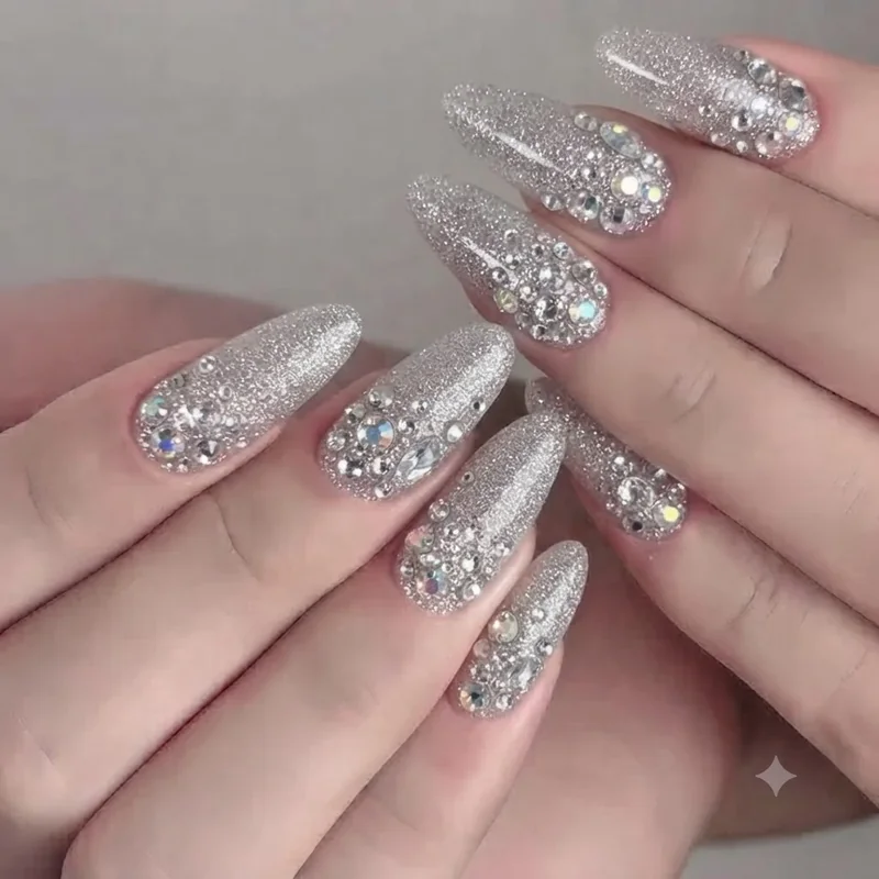Glitter and rhinestone Hello Kitty nail set showing durable embellishment placement technique