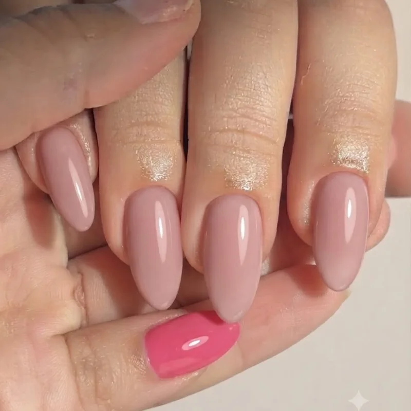 Side by side my melody nails soft pink set next to a bolder Hello Kitty pink nail set comparison