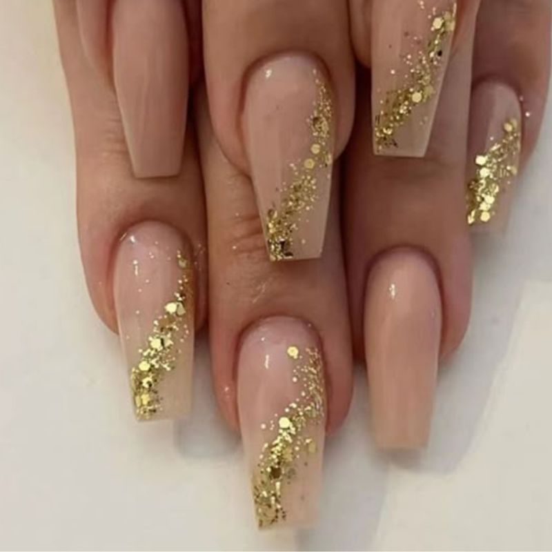 Glitter gradient new year nails with silver and gold sparkle ombre effect