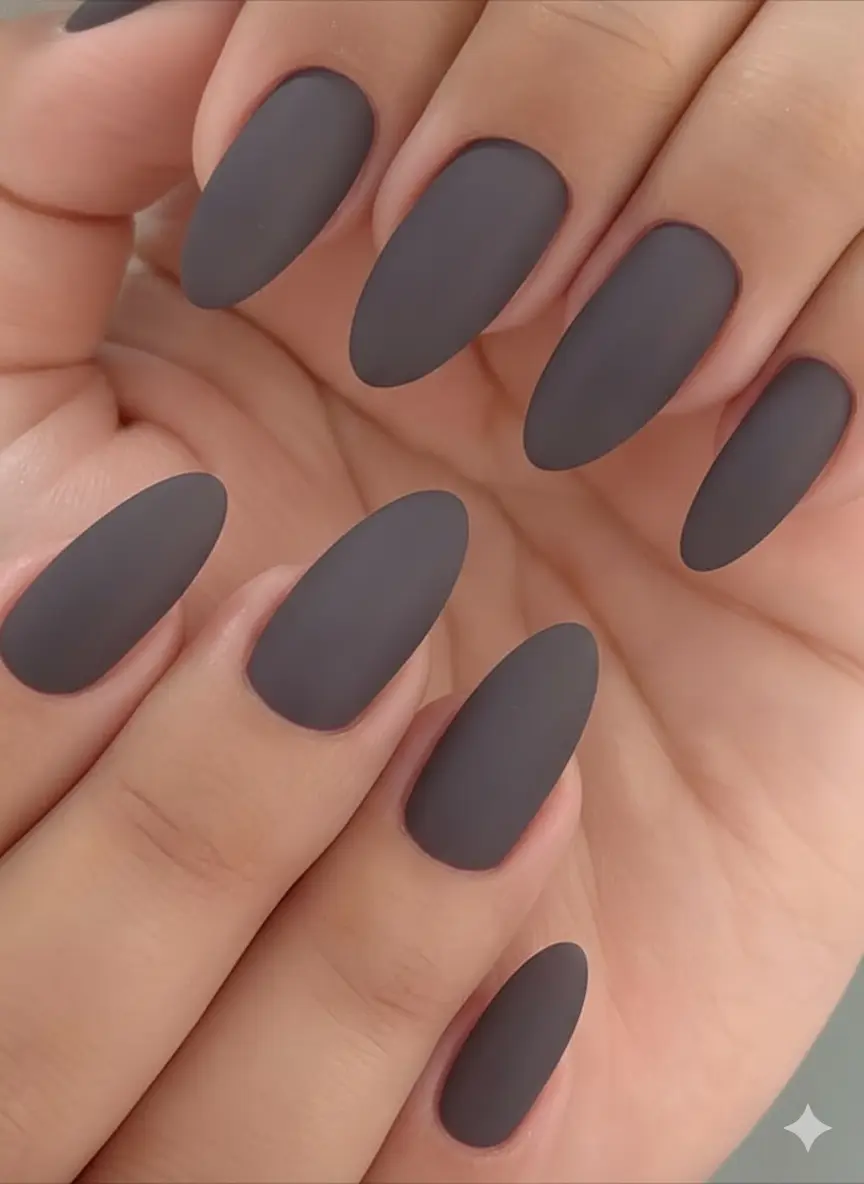 Everyday wearable goth nail colors in dark plum deep mauve and charcoal sheer finish suitable for office and professional settings