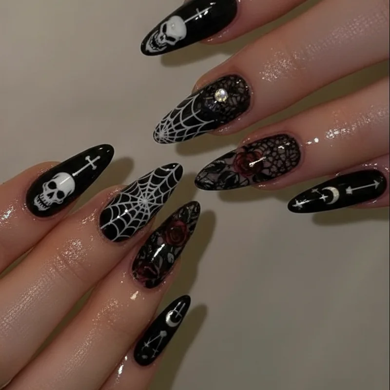 Gothic nail motifs showing skulls crosses spider webs dark florals lace and celestial designs as goth nail art guide